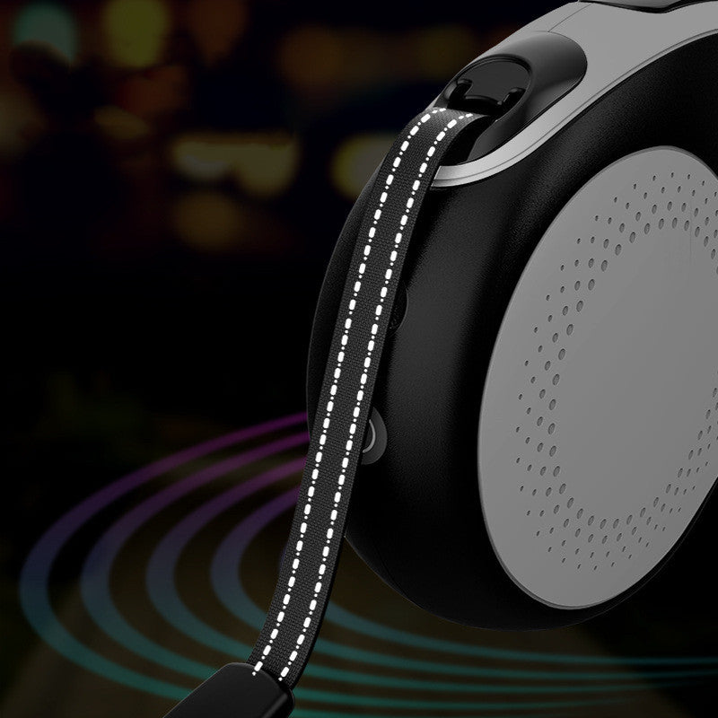 Black pet automatic retractable leash with reflective stitching and ergonomic handle design